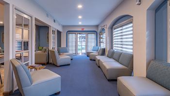 canyon oaks clubhouse with cozy couches and nice natural lighting